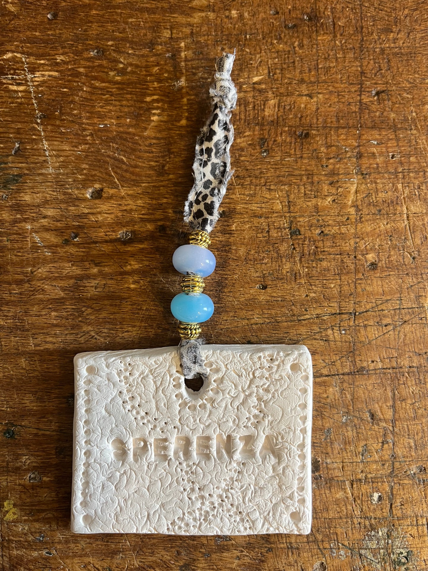 Amulette « Sperenza » perles bleues