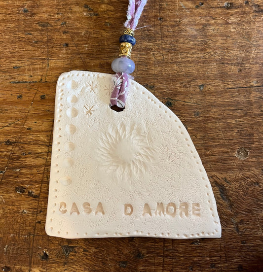 Amulette « Casa d’amore » fleur